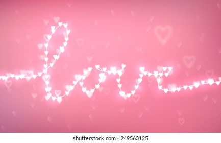 Bokeh light blurry romantic background with illuminated word love. Holiday magic shiny wallpaper poster banner card