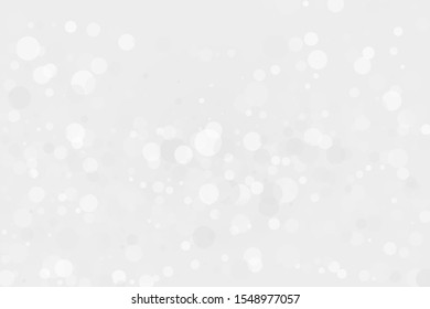 Bokeh light for decoration design. Grey paper texture. Christmas card holiday concept. Gray-white texture. Abstract shape. Christmas decoration element. Xmas wallpaper. Blurred light frame.