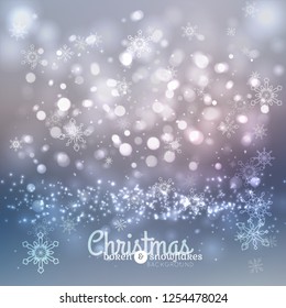 Bokeh lights and snowflakes chritmas background