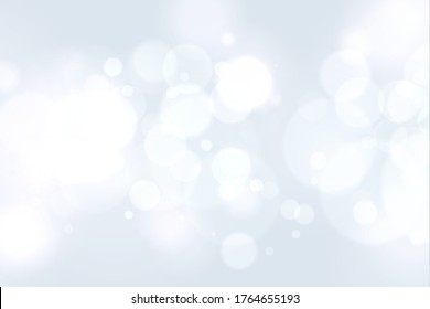 The bokeh on the white background blurred the natural gray and white. Bokeh colorful glows sparkle. vector illustration.