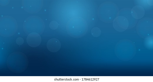 Bokeh style of abstract circles of blur glow spark light on blue mesh gradient background