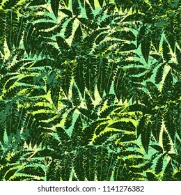 Bold abstract jungle print with silhouette of paradise island foliage. Vector seamless floral green pattern inspired by tropical nature and plants with shape of palm leave and ferns. Summer background