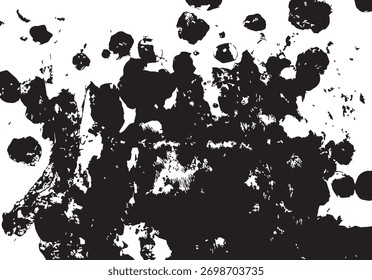 Bold black and white abstract pattern created by ink splashes on a canvas