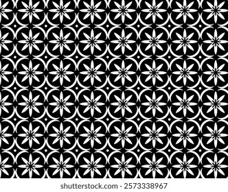 Bold black-and-white geometric pattern with floral and crescent shapes in a symmetrical arrangement.