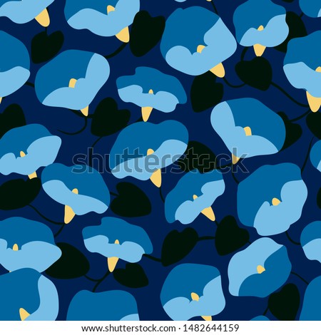 Bold floral seamless pattern with geometrical shaped Morning glory flowers, blue on black background