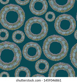 Bold fun seamless vector dots pattern with snake textured circles. Surface pattern design for fabric, scrapbooking, wallpaper projects or backgrounds.