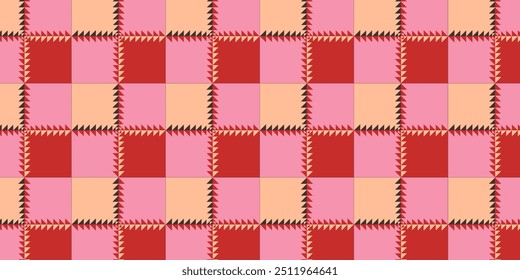 The bold Geometric Pattern features checkered pieces in warm reds, pinks and peaches, accented with sharp triangular details.