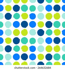 Bold geometric pattern with randomly colored circles in bight blue green colors. Vector seamless texture in vintage 1960s fashion style. Modern hipster background with dots.