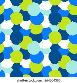 Bold geometric pattern with randomly colored circles in bight blue green colors. Vector hand painted seamless texture in vintage 1960s fashion style. Modern hipster background with colorful dots.