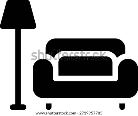 Bold glyph icon of a sofa and lamp, filled home interior furniture silhouette.