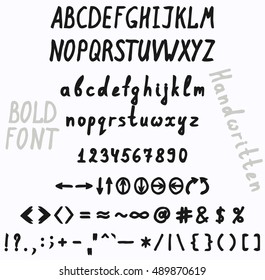 Bold handwritten font. A set of uppercase and lowercase letters digits punctuation marks and arrows.