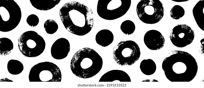 Bold irregular circles seamless pattern. Brush drawn thick spots and rough blots. Abstract geometric banner with bold round shapes. Retro organic texture. Vector dotted background.