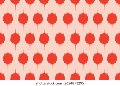 Bold red ikat-style droplets repeat across a soft peach background, creating a vibrant and textured textile design.