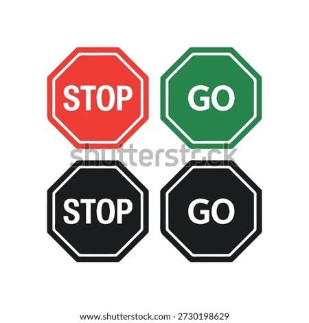 Bold stop and go signs in red green and black with contrasting text