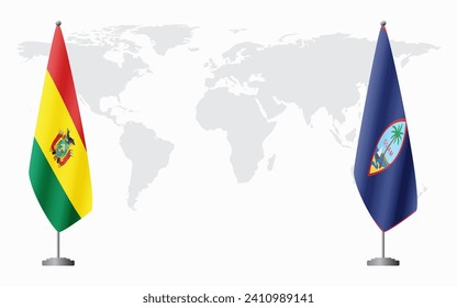 Bolivia and Guam flags for official meeting against background of world map.
