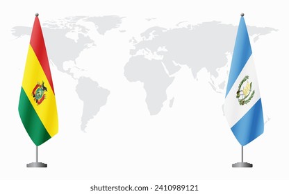 Bolivia and Guatemala flags for official meeting against background of world map.