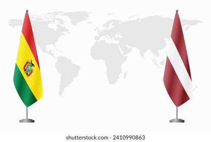 Bolivia and Latvia flags for official meeting against background of world map.
