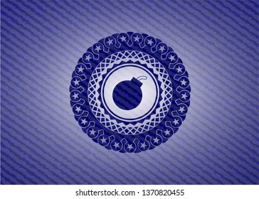 bomb icon inside badge with jean texture