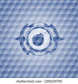 bomb icon inside blue badge with geometric pattern.