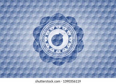 bomb icon inside blue emblem or badge with geometric pattern background.