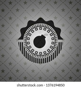 bomb icon inside dark badge or emblem