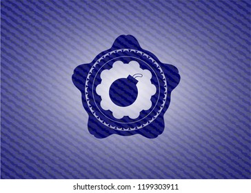 bomb icon inside emblem with denim high quality background