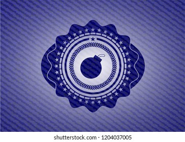 bomb icon inside emblem with jean background