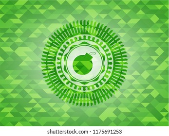 bomb icon inside green emblem with triangle mosaic background