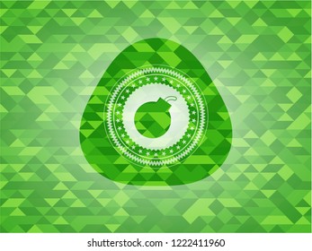 bomb icon inside green emblem with mosaic ecological style background