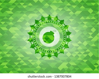 bomb icon inside green emblem with mosaic background