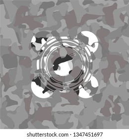 bomb icon inside grey camo texture