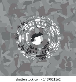 bomb icon inside grey camo texture