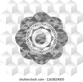 bomb icon inside grey icon or emblem with geometric cube white background