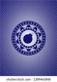 bomb icon inside jean or denim emblem or badge background