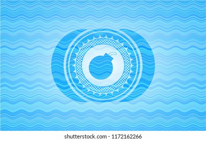 bomb icon inside light blue water emblem background.