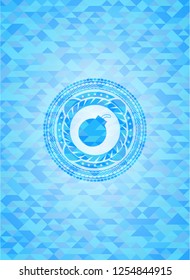 bomb icon inside realistic light blue emblem. Mosaic background