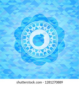 bomb icon inside realistic light blue mosaic emblem