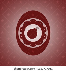 bomb icon inside red emblem