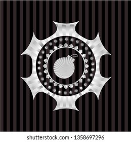 bomb icon inside silver badge or emblem