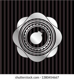 bomb icon inside silver emblem
