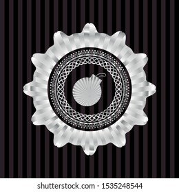 bomb icon inside silver emblem or badge