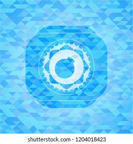 bomb icon inside sky blue emblem with mosaic ecological style background