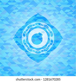 bomb icon inside sky blue emblem with mosaic ecological style background