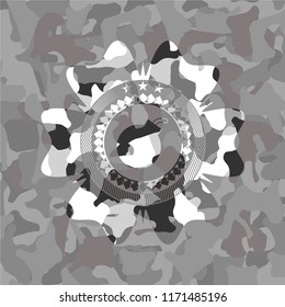 bomb icon on grey camo pattern