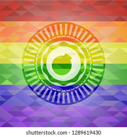 bomb icon on mosaic background with the colors of the LGBT flag