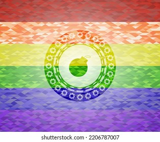 bomb icon on mosaic background with the colors of the LGBT flag. 