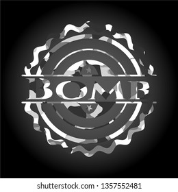 Bomb on grey camouflaged pattern