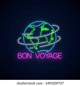 Bon voyage glowing neon banner with spinning earth sign and text on dark brick wall background. Have a nice trip wish banner. Vector illustration.