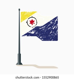 Bonaire flag with scratches, vector flag of Bonaire waving on flagpole with shadow.
