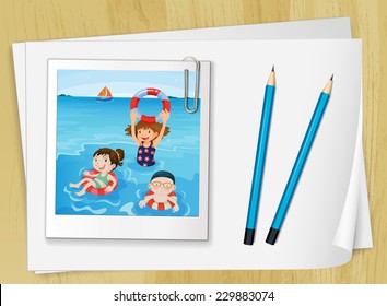 Bondpapers with a picture frame and two blue pencils